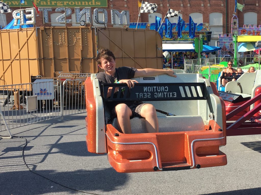 Taylor in twirly thing at Great Allentown Fair